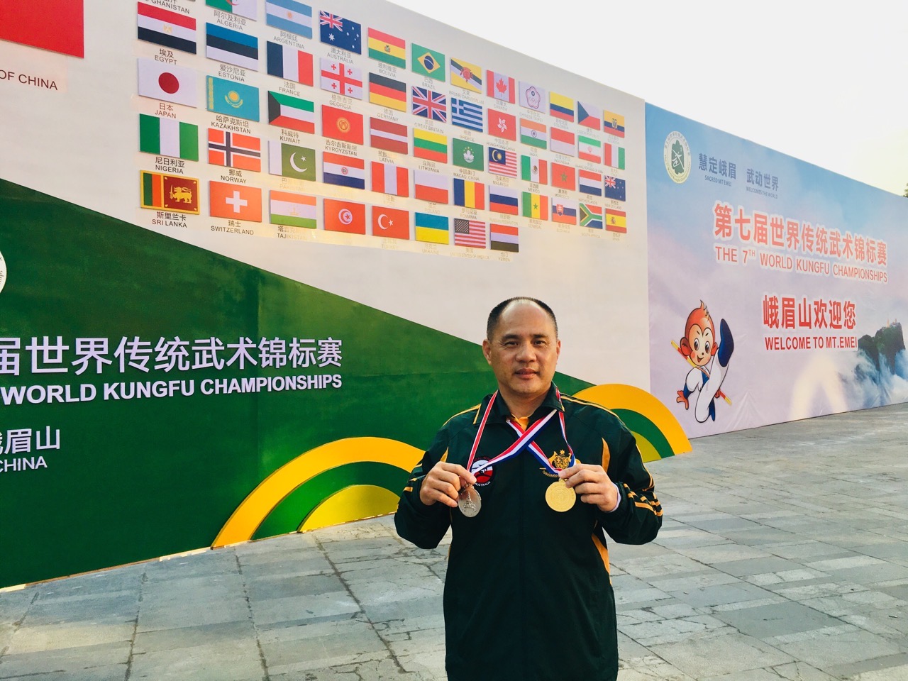 Master Stephen Lin displaying competition medals
